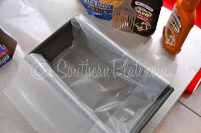Line a loaf pan with waxed paper.