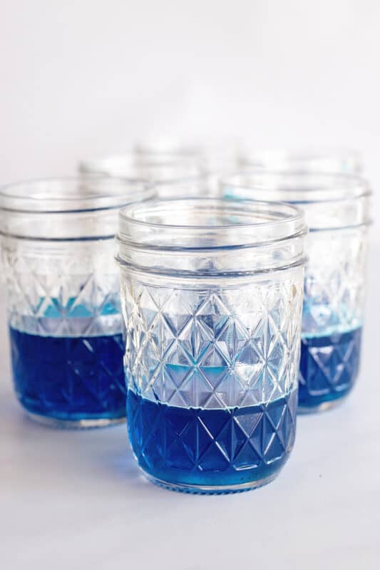 blue jello in jars.