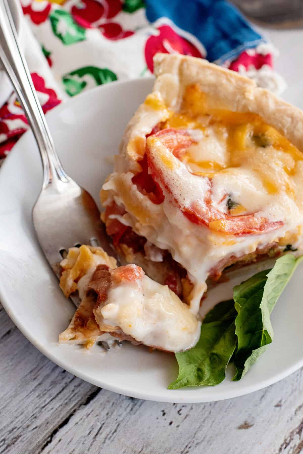 Forkful of tomato pie.