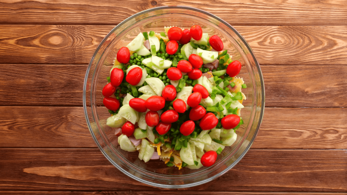 Add tomatoes to bowl.