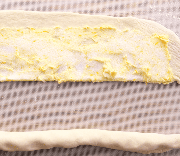 Roll dough lengthways into a skinny stick.