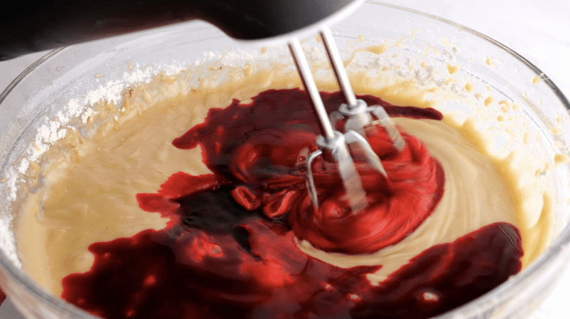 Mix with an electric mixer and then add the red food coloring.