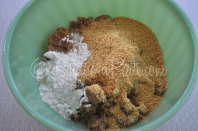 Place flour, brown sugar, and graham cracker crumbs in bowl.