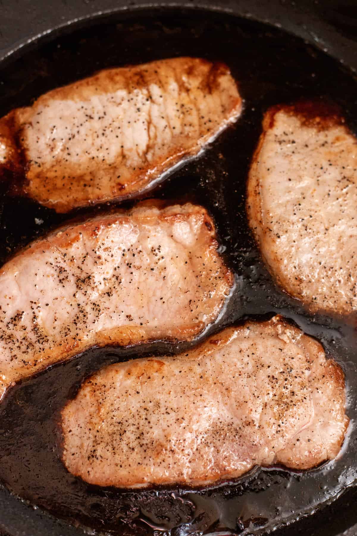 add pork chops to pan