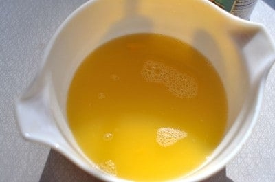 Canned fruit juice in a bowl.