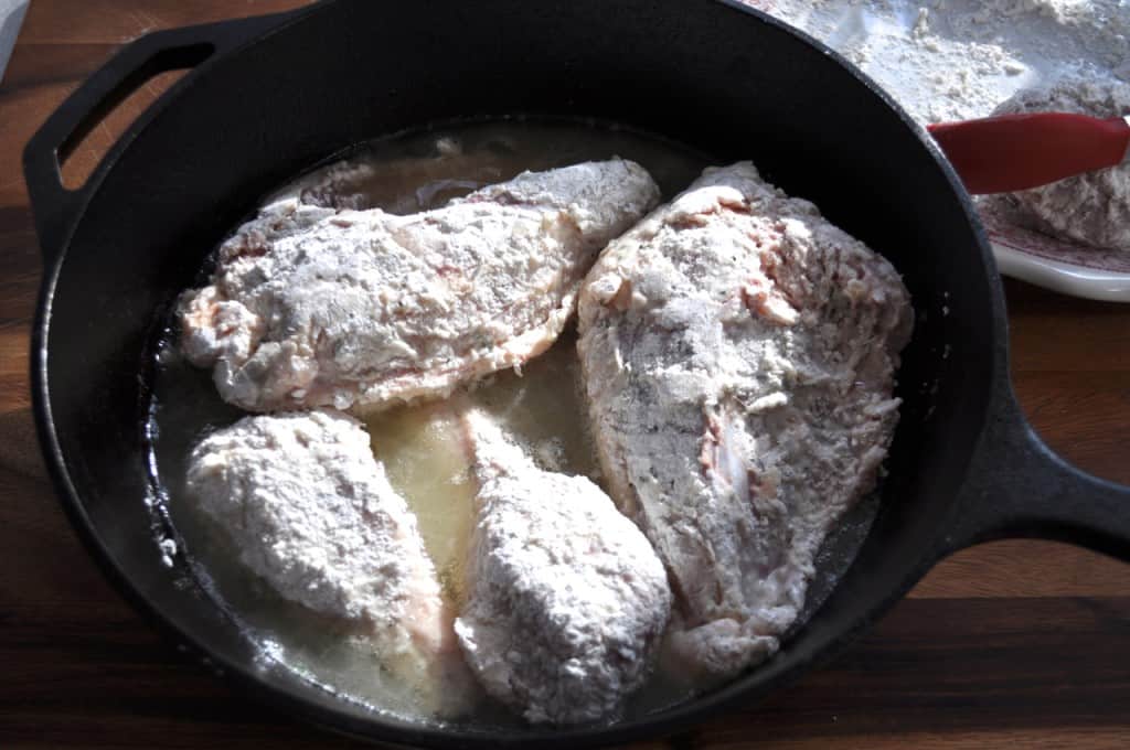 Fuss Free Fried Chicken - This is a way to actually fry chicken, in oil, in your oven Breaded chicken in hot skillet.
