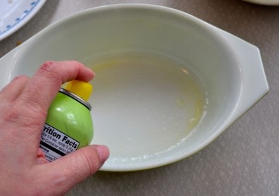 Grease baking dish with cooking spray.