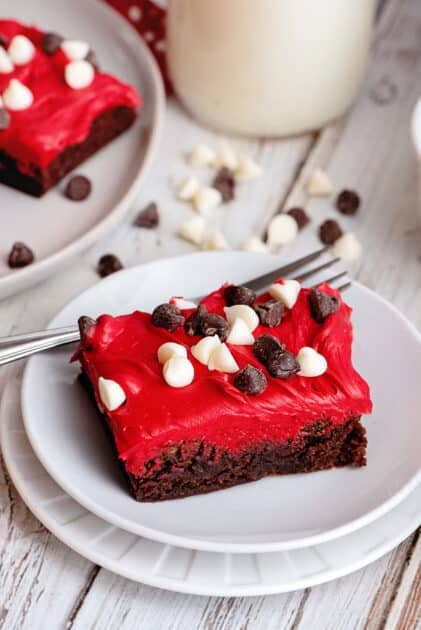 A plate with one frosted Valentine's Day brownie.