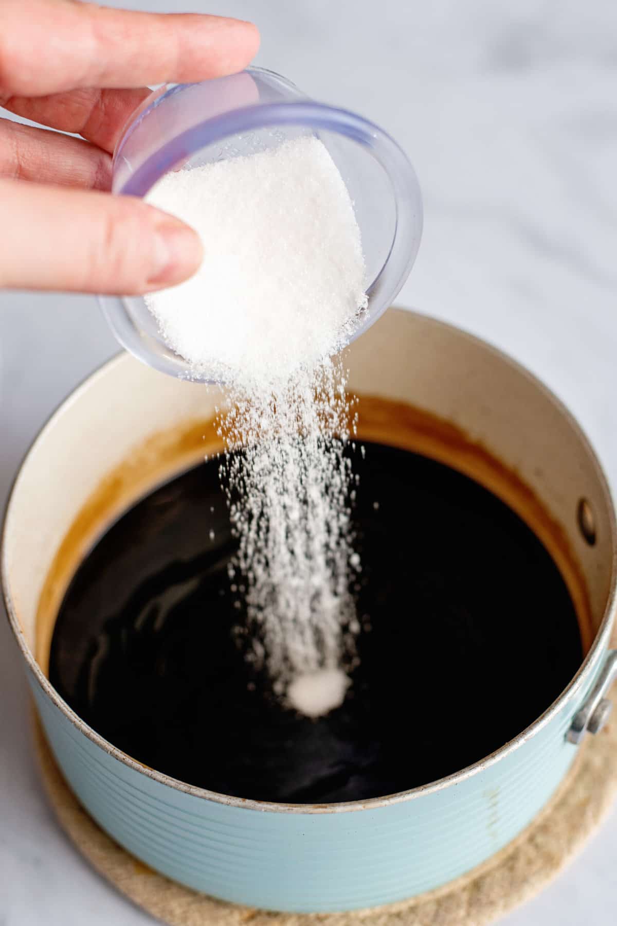 remove from heat and stir in sugar