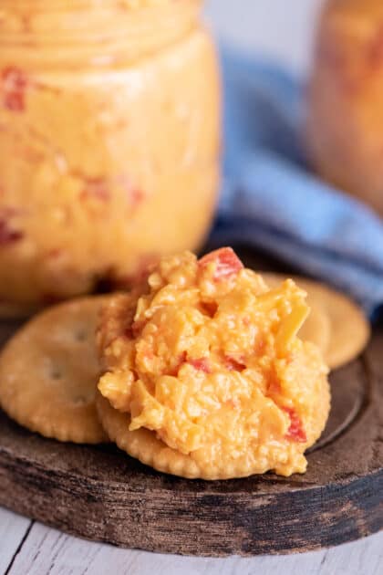Spicy pimento cheese on a cracker.