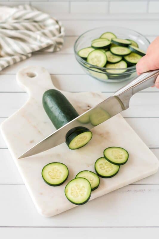 Slicing a zucchini.