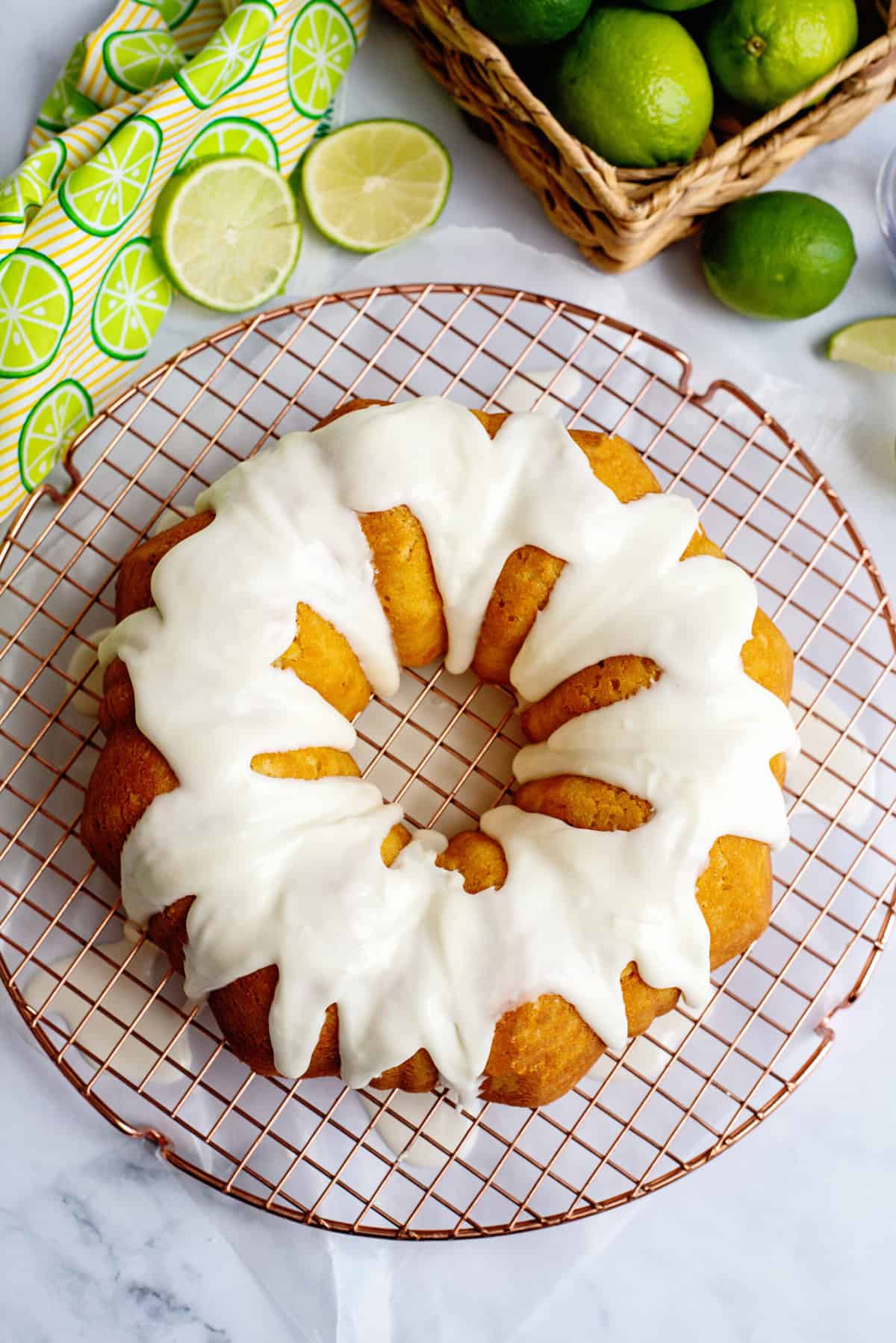 Pour the glaze over the buttermilk lime pound cake