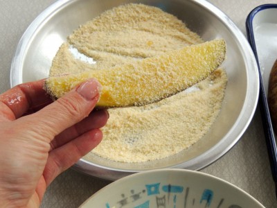 Then dip each wedge in the parmesan mixture.