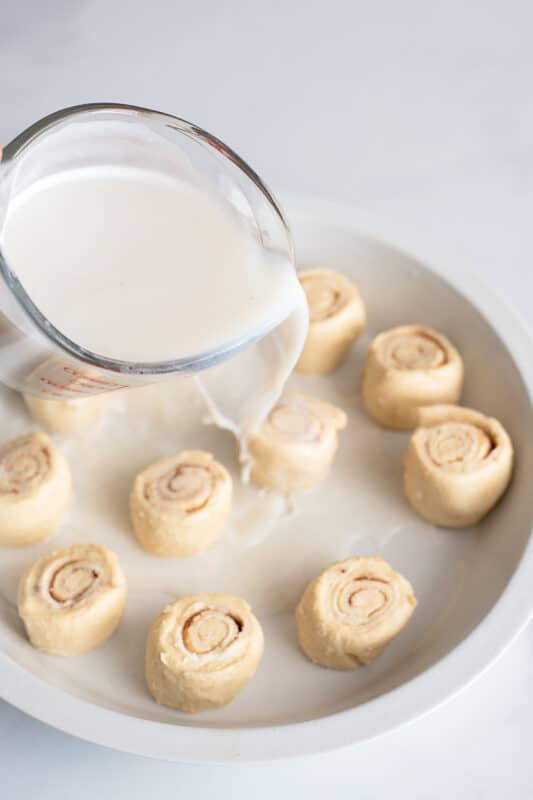 pour the milk over the butter roll dough slices