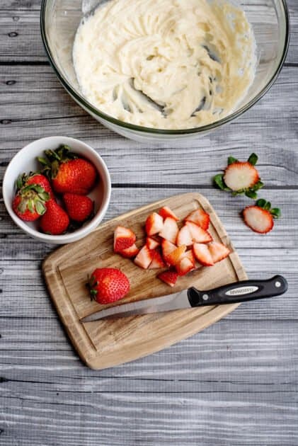 Wash and chop up your strawberries.