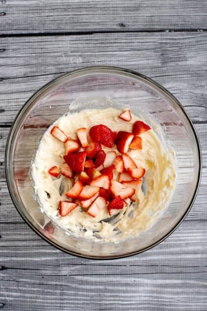 Add strawberries to mixing bowl.