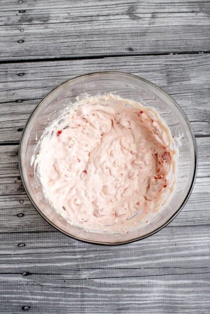 Mix strawberries into mixture.