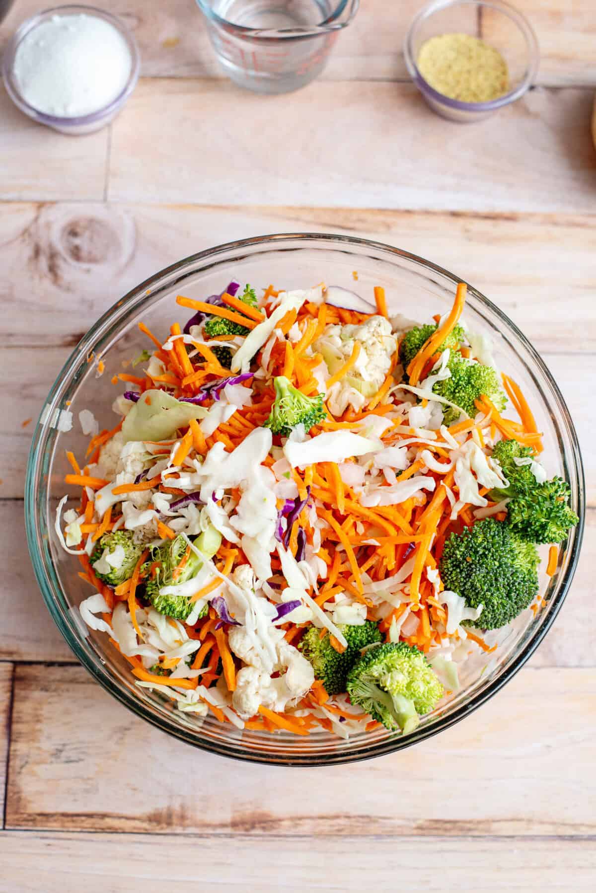 A veggie medley in a glass mixing bowl.