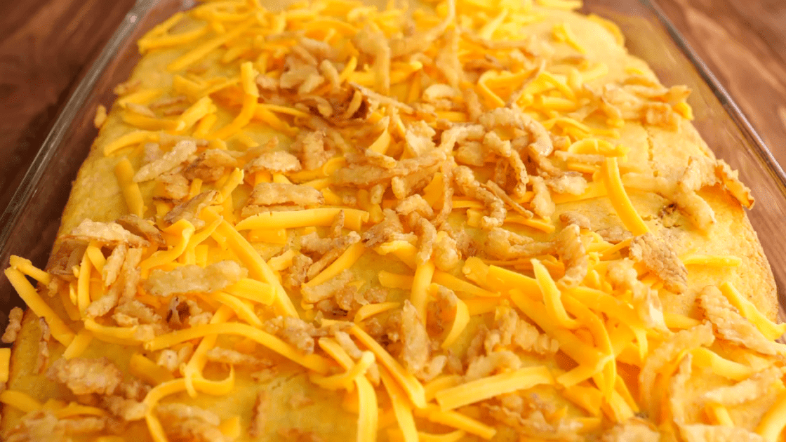 Top tamale pie with remaining cheese and fried onions.