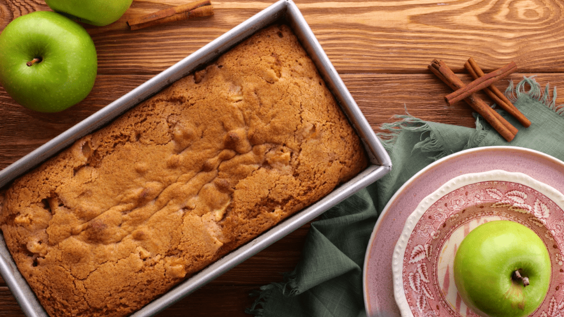 Baked apple bread in pan.