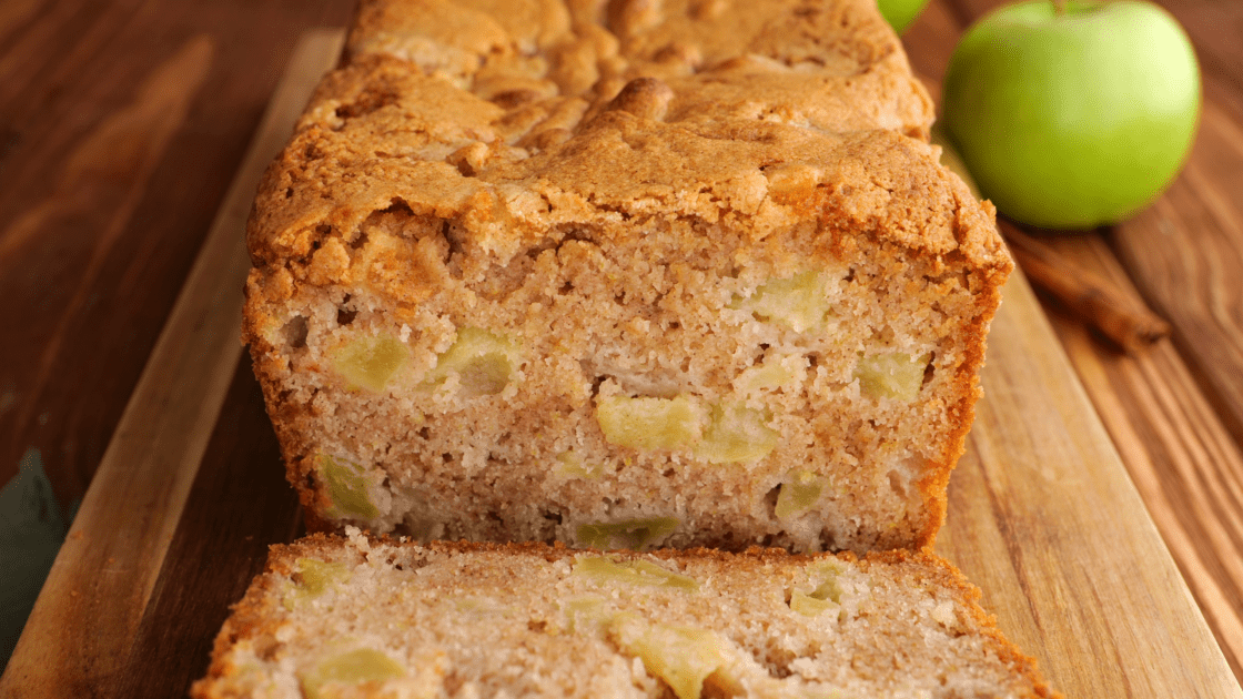 Close-up of a slice of apple bread.