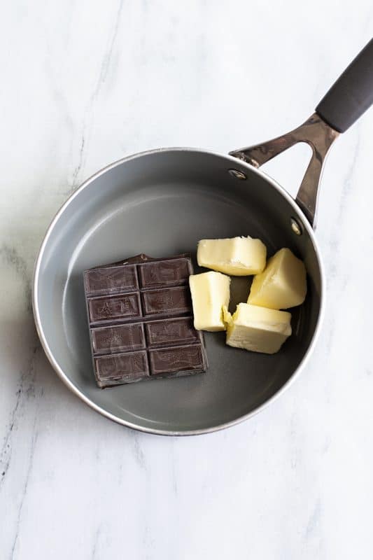 Melt butter and chocolate over low heat.