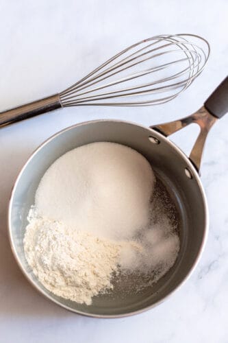 Flour, sugar, and salt in saucepot.