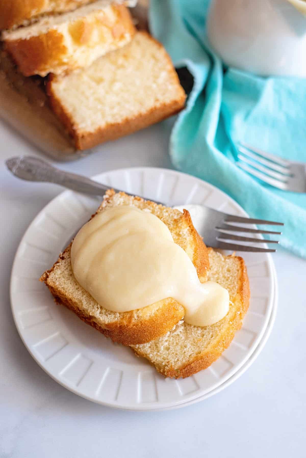 Custard sauce poured over pound cake.