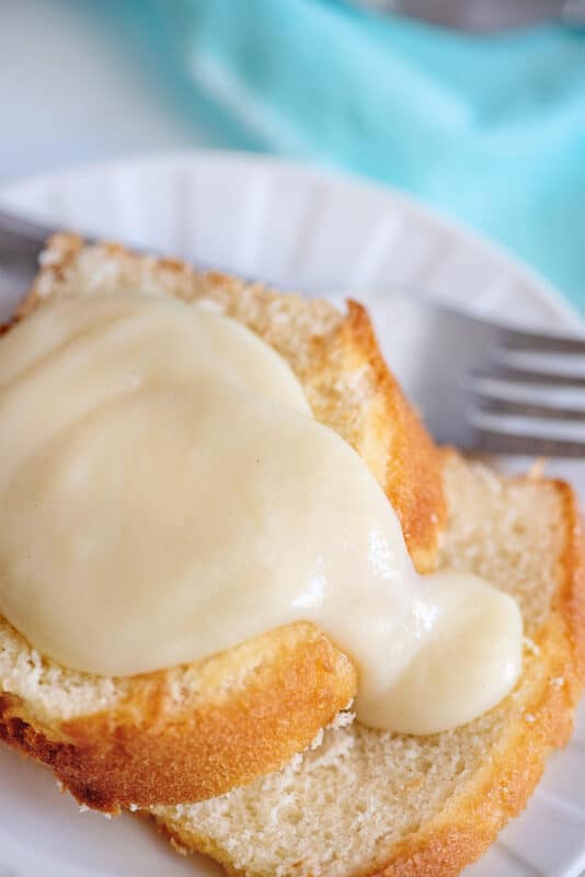 Custard sauce poured over pound cake.