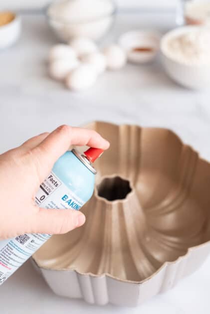 Grease bundt pan with cooking spray.