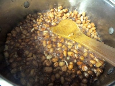 Peanuts boiling in sugar syrup.