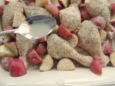 Drizzle lemon juice over baking dish.