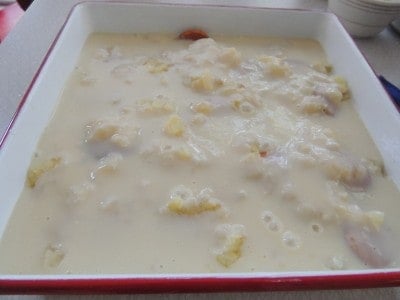 Top vanilla wafer and pineapple layers with remaining pudding.