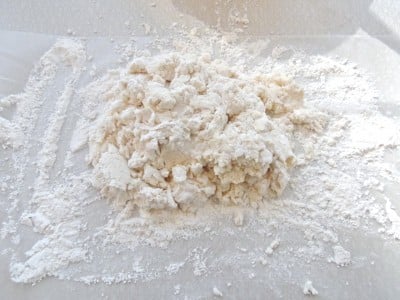 Dump dough on floured surface.