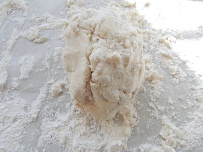 Southern biscuit dough on floured surface.