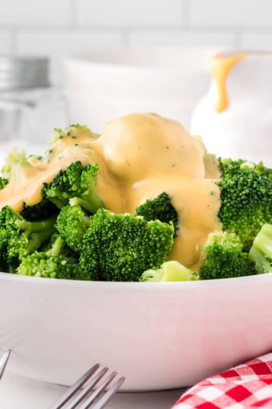 Broccoli with cheese sauce.