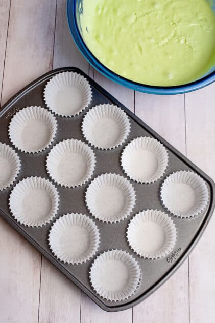 Line muffin tin with liners.