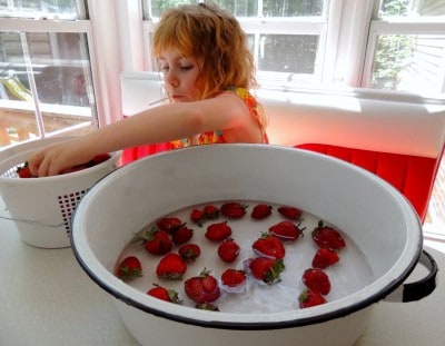 Wash strawberries.