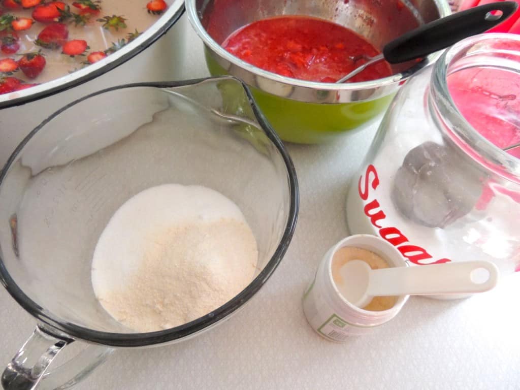 Add sugar and instant pectin to a measuring bowl.