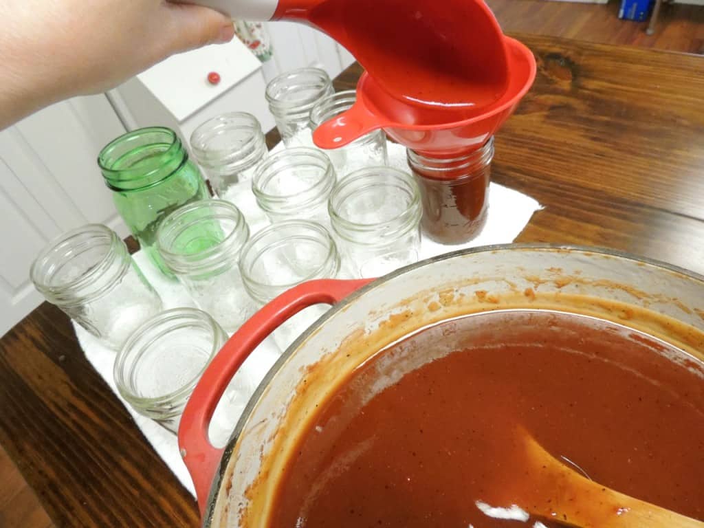 Christy's Number 5 BBQ Sauce Putting easy BBQ sauce into a jar