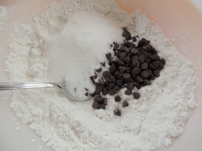 Stir in sugar and chocolate chips.