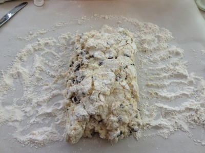 Fold other side in to make a log-looking chocolate chip biscuit dough.