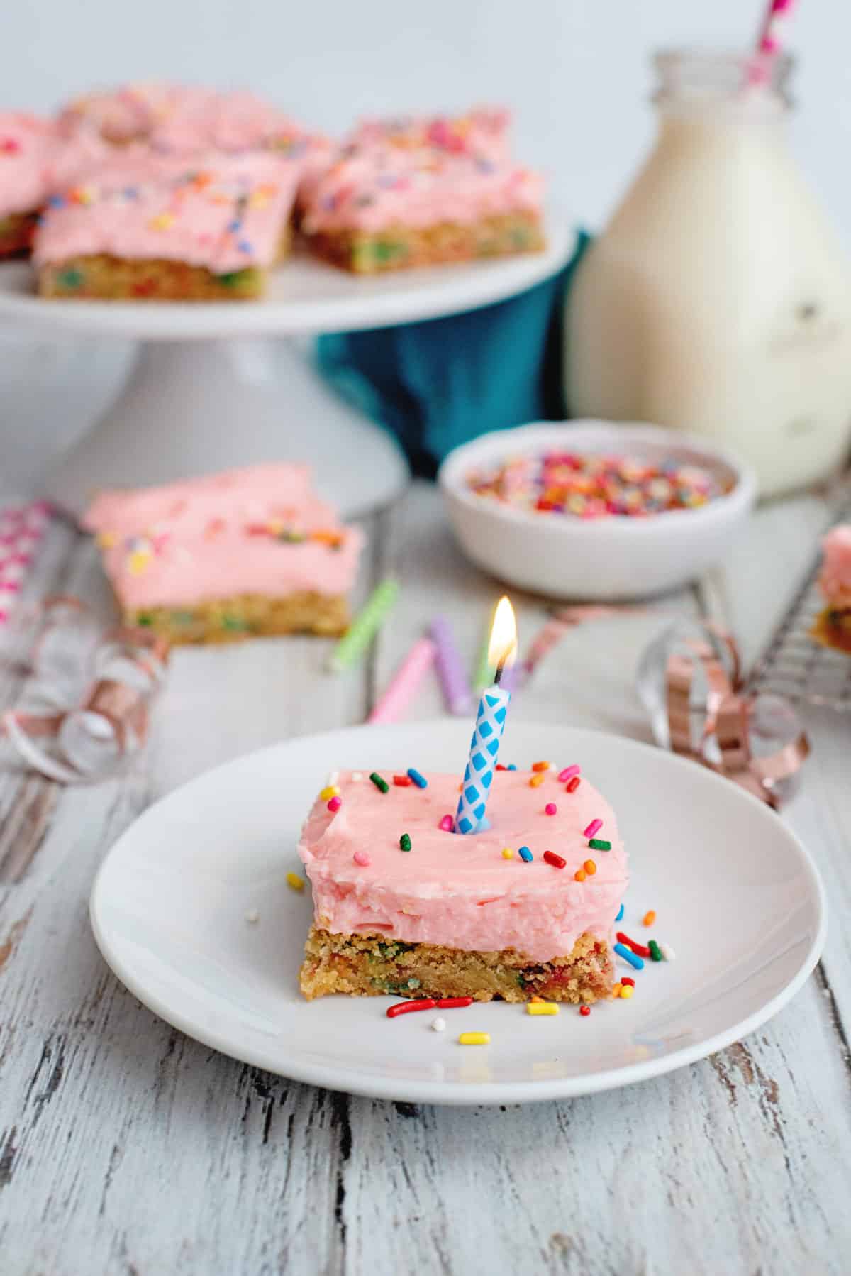 Birthday cake cookie bar on plate.