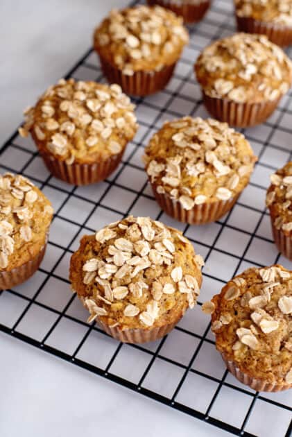 Apple bran muffins cooling on wire rack.