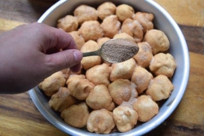 Sprinkle extra cinnamon sugar over monkey bread.