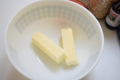 Place butter in large bowl.