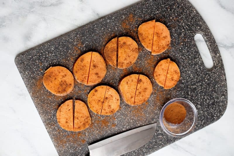 Cut sweet potato and sprinkle with spices.