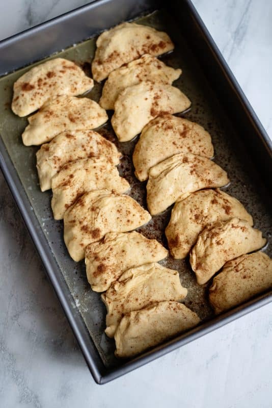 Line baking tray with sweet potato dumplings.