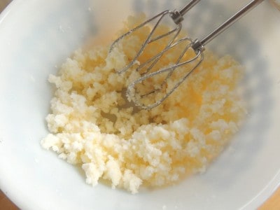 Cream butter and sugar until fluffy.