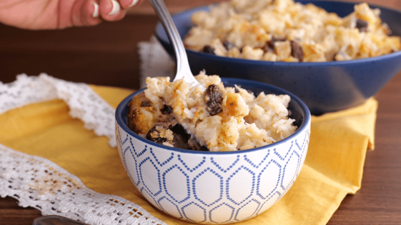 Spoonful of old fashioned bread pudding.